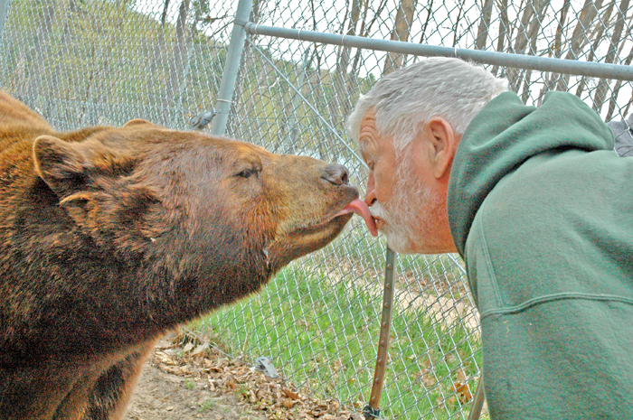 Dean Oswald with bear cub